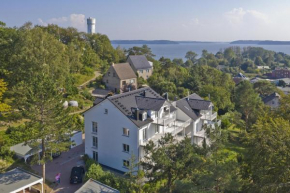 Ferienresidenz Zwei Bodden FeWo2-8 - Balkon, Sauna, Kamin Lietzow